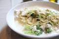 Alfredo spaghetti broccoli chicken white sauce in restaurant background Royalty Free Stock Photo