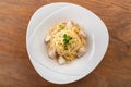 Alfredo spaghetti pasta with chicken fillet and sauce on a white plate Royalty Free Stock Photo