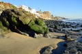 Algae covered boulder on shore of Cress Street Beach in Laguna Beach, California. Royalty Free Stock Photo