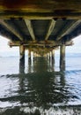 The Underside of A Pier On The Beach