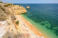 Algarve Portugal: Huge rocks at the cliff beach Praia da Marinha, lovely hidden beach near Lagoa Royalty Free Stock Photo