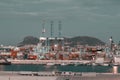 Night view of the port of Algeciras, full of containers and huge cranes with the Rock Royalty Free Stock Photo