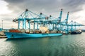 Algeciras, Spain - October 22, 2013. Industrial part of port with cranes Royalty Free Stock Photo