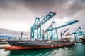 Algeciras, Spain - October 22, 2013. Industrial part of port with cranes Royalty Free Stock Photo