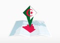 Algeria is depicted on a folded paper map and pinned location marker with flag of Algeria Royalty Free Stock Photo