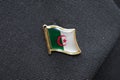 Algeria flag lapel pin on a suit Royalty Free Stock Photo