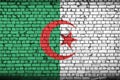 Algeria flag is painted onto an old brick wall Royalty Free Stock Photo