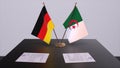 Algeria and Germany flag, politics relationship, national flags. Partnership deal 3D illustration