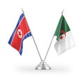 Algeria and North Korea table flags isolated on white 3D rendering