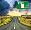 Algeria road sign against clear blue sky Royalty Free Stock Photo