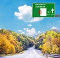 Algeria road sign against clear blue sky Royalty Free Stock Photo