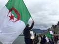 Algerian flag, in Geneva, protest against Bouteflika`s candidacy for election