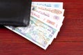 Algerian money in the black wallet