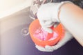 Alginate impression, orthodontist prepares a pink mixture to measure the patient`s mouth Royalty Free Stock Photo