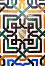 Background of arab tiles, islamic pattern mosaic. Palace of Alhambra in Granada, Andalusia, Spain