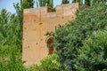 Alhambra tower and green trees Royalty Free Stock Photo