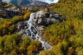 Alibek waterfall in the Caucasus mountains and autumn forest Royalty Free Stock Photo