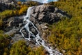 Alibek waterfall in the Caucasus mountains and autumn forest Royalty Free Stock Photo