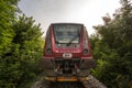 Srbija Voz DMU Diesel unit from Serbian railways, a Metrovagonmash 711 class passing the city of Alibunar on its way to Vrsac.