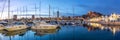 Alicante Port d`Alacant marina with boats and view of castle Castillo twilight travel traveling holidays vacation panorama in Royalty Free Stock Photo