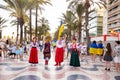 ALICANTE, SPAIN - AUGUST 24 2023: Ukrainians on march, national dress, people dancing. Celebration of Ukrainian Independence day,