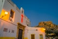 View of the small hermitage of Santa Cruz at dusk, in Alicante, Spain