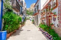 ALICANTE SPAIN- JULY 18 2019: Colored picturesque houses street.Typical neighborhood historic center casco antiguo barrio sant