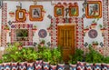 ALICANTE SPAIN- JULY 18 2019: The facade of a typical traditional house in the Santa Cruz district of Alicante. Colored