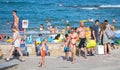 Alicante, Spain, July 23, 2019: People at Mil palmeras beach. Crowded beach in Alicante during summertime in 2019