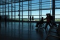 Alicante, Spain - 11 June, 2019: Silhouette of Passengers at Departure Terminal in Alicante International Airport