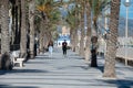 People walking along the Paseo Maritimo de San Juan in Alicante in 2022 Royalty Free Stock Photo