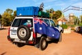 Alice Springs, Australia - December 29, 2008: Off-road car with australian flag standing near Curtin Springs Roadhouse, Australian