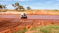 Alice Springs, Australia - December 30, 2008: Off-road car crossing the river on the country road, Australian Northern territory