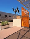 The famous Ghan railway at the Alice Springs terminal with a local sign