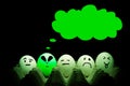 Alien egg with thought cloud. Eggs in a basket with a green alien egg Royalty Free Stock Photo