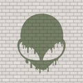 Alien face illustration in brick wall Royalty Free Stock Photo