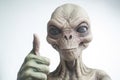 Alien humanoid shows thumb up gesture on white background. Generative AI Royalty Free Stock Photo