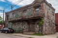 alien mural, with intricate details and hidden messages, covering entire building facade