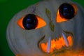 alien pumpkin with black eyes and shark teeth detail