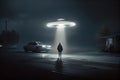 An alien saucer hovering over the city. UFO, alien invasion, unidentified flying object, visitors from space. The Royalty Free Stock Photo