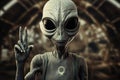 Alien showing peace sign on Camera. Alien. Extraterrestrial Life Concept. Royalty Free Stock Photo