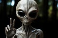 Alien showing peace sign on Camera. Alien. Extraterrestrial Life Concept. Royalty Free Stock Photo