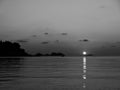 Alien sunset over the sea black and white Royalty Free Stock Photo