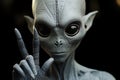 Alien showing peace sign on Camera. Alien. Extraterrestrial Life Concept.