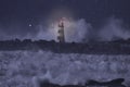 Alight beacon in a stormy sea at night Royalty Free Stock Photo