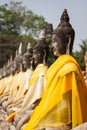 Aligned Buddha Statues at Wat Yai Chaimongkol Ayutthaya Bangkok Royalty Free Stock Photo