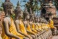 aligned buddha statues Wat Yai Chaimongkol Ayutthaya bangkok thailand Royalty Free Stock Photo