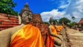 Aligned buddha statues at Wat Yai Chaimongkol Ayutthaya, Bangkok, Thailand Royalty Free Stock Photo