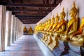 Aligned Buddha statues at Wat Phutthaisawan, Ayuthaya, Thailand.