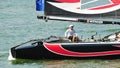 Alinghi skipper steering boat at Extreme Sailing Series Singapore 2013 Royalty Free Stock Photo